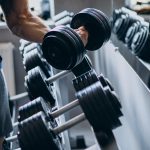 Strong man training in gym